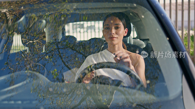 Elegant driver sitting automobile looking mirror correcting makeup close up.
